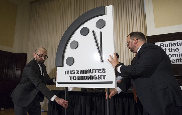 Atomic, atmosphere dangers keep Doomsday Clock near end of the world 