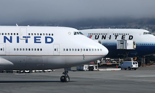  Video shows man forcibly removed from United flight from Chicago to Louisville