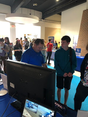 David Dean, VMI Lead Engineer discussing the dredging industry with a student at Central Area Vo-Tech Drumright Campus STEM Day 2024