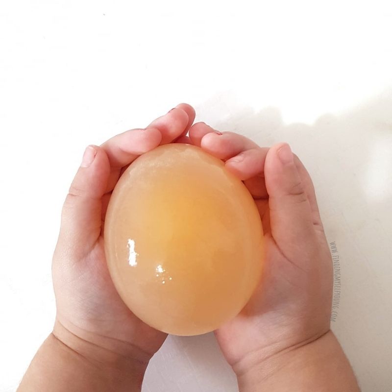 bouncy egg in childs hands