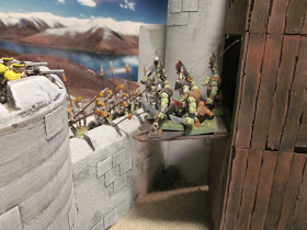 Orcs attacking castle with Warhammer Siege Tower
