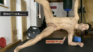 sexercise naked trainer showing side plank exercise with erection