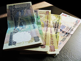 rupee notes laptop background