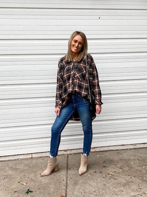 oversized plaid shirt with jeans and tan booties