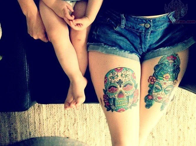 Tatuajes en el muslo para mujeres