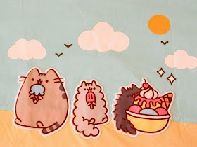 A vest top/tank top featuring Pusheen the cat characters at the beach 