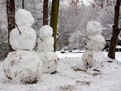 Images lifesize snowmen in my frontyard and my enchanted forest in the