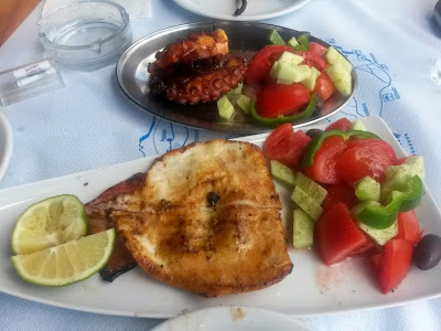 Octopus and squid grilled in Santorini