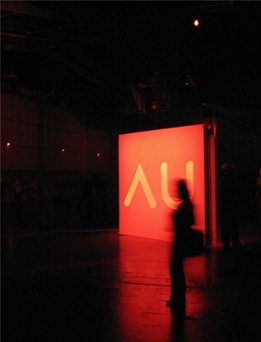 AU