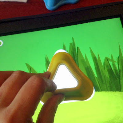 http://www.difflearn.com/product/Tiggly_Shapes/learning_games/?a=toysaretools/