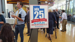 Members of the public, disability community and professionals attended the ADA 25 reception.