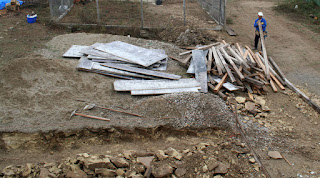 Starting to sort through the wood to build the shuttering