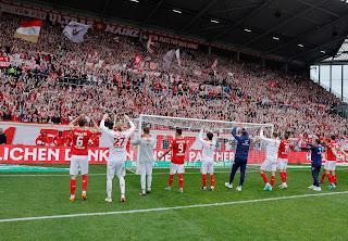 Mainz players celebrate 3-1 home victory over Bayern Munich in the Bundesliga match on Saturday 22 April, 2023