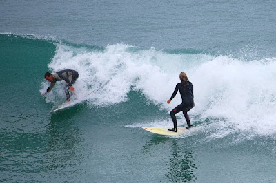 Jen surfing drop in guy kook