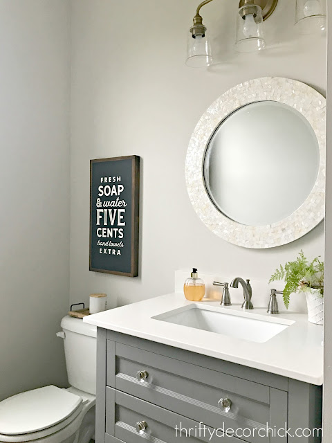 gray vanity with shelf powder room