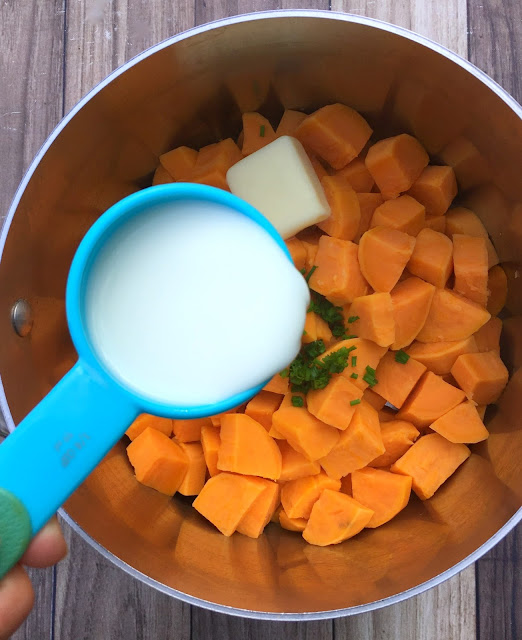 Mashed sweet potatoes with coconut yogurt and chives. The perfect Thanksgiving side dish recipe. | www.jacolynmurphy.com