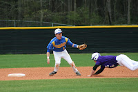 Connor Torruella applies the tag