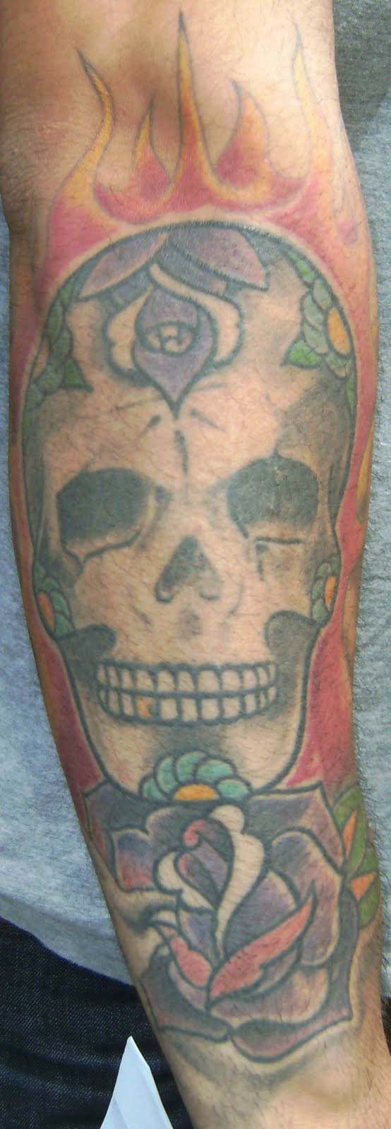 Forearm tattoos skulls designs