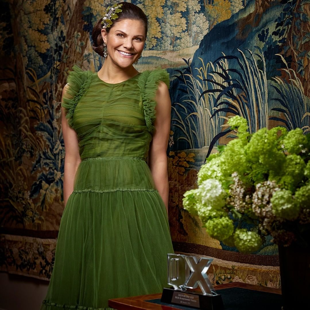 Victoria is wearing H&M Conscious green Tulle dress