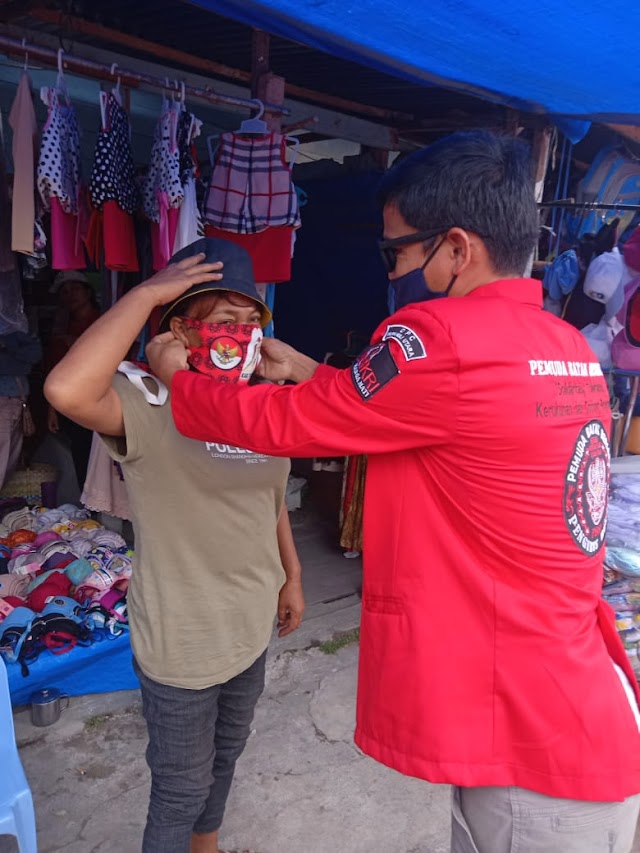 Pemuda Batak Bersatu Taput Bagikan Masker kepada Masyarakat