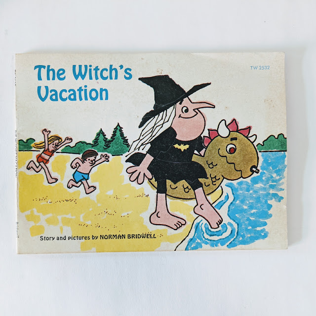 image of childrens book cover with text and a witch and two kids