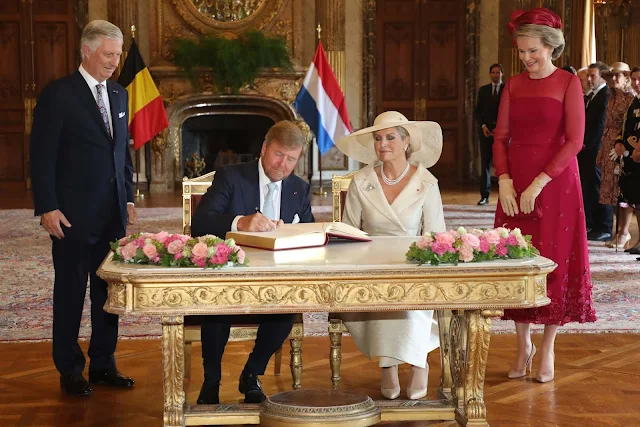 Queen Maxima wore an new outfit by Edouard Vermeulen van Natan. Queen Mathilde wore a red chiffon midi dress by Natan