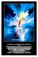 Superman poster - blue background with S logo and red and yellow speed lines