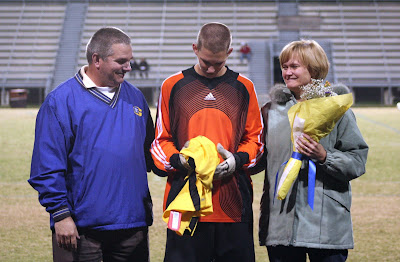 Drew Gay with his parents Angie and Andy Gay