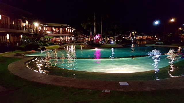 night shot of the swimming pool (kiddie pool side) at Sabin Resort Hotel in Ormoc City
