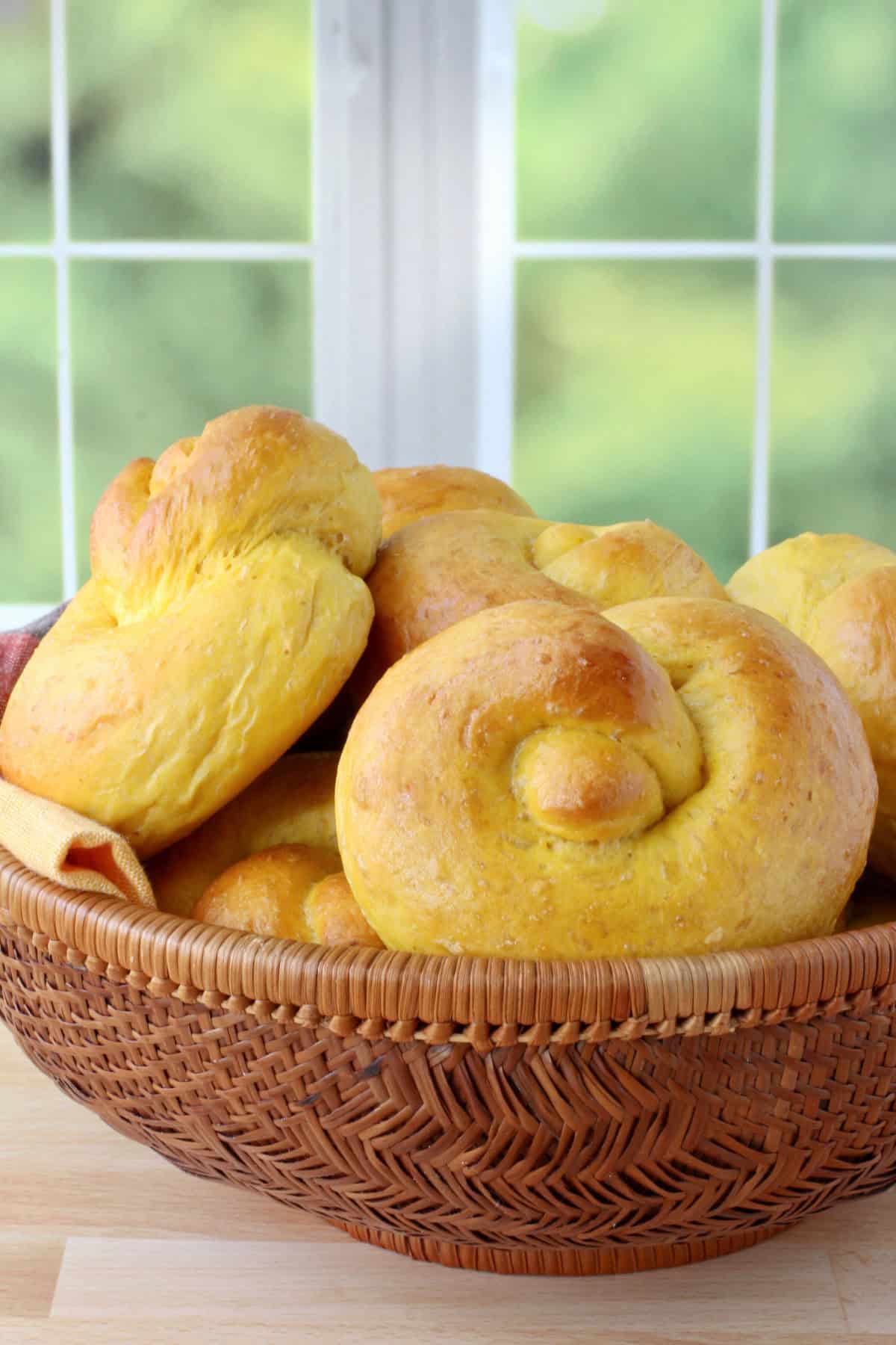Pumpkin Dinner Rolls in a basket