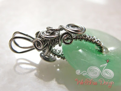 wire wrapped jade donut pendant