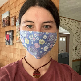 fair trade jewelry with mask