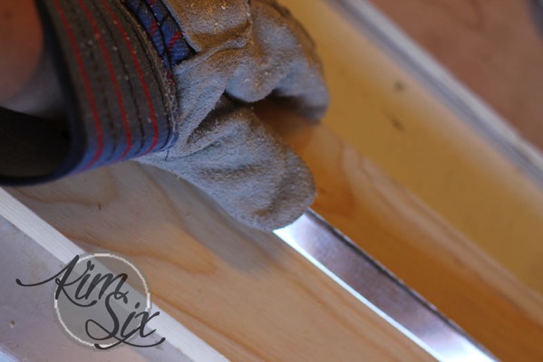 Creasing metal to wrap around board