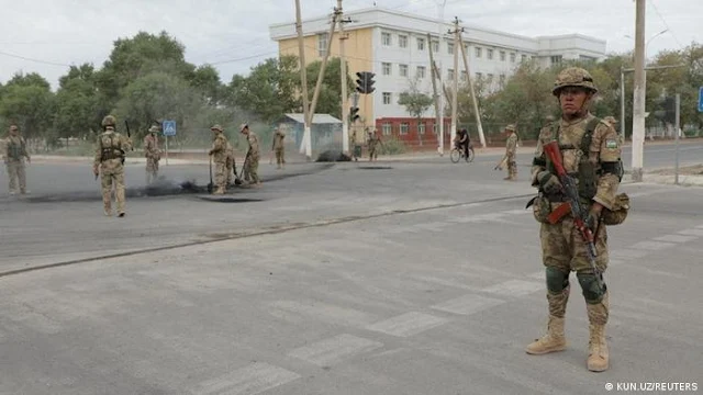 Image Attribute: Images from Nukus, the capital of the Karakalpakstan region, showed burned-out vehicles reportedly damaged during protests / Source: KUN.UZ/REUTERS