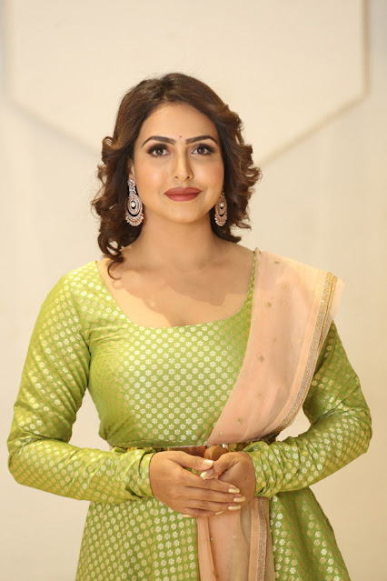 Telugu Actress Nandini Rai exudes glamour and elegance in these sensational stills, capturing hearts with her magnetic presence.