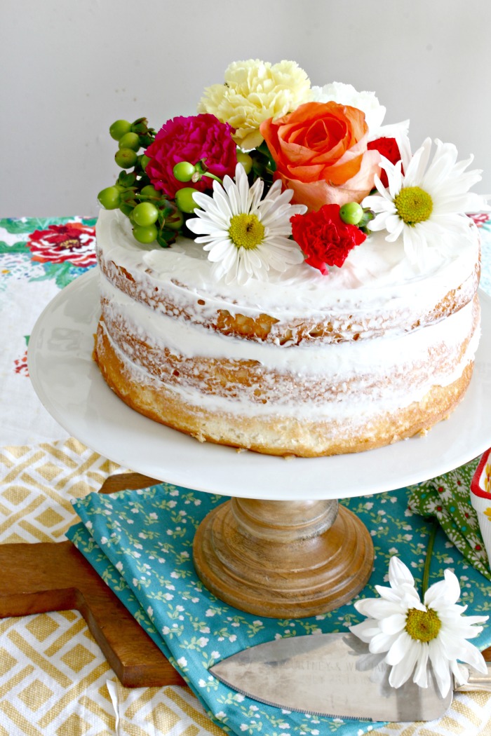 Easy Spring Naked Cake Made Using Boxed Cake Mix & Grocery Store Flowers - www.goldenboysandme.com