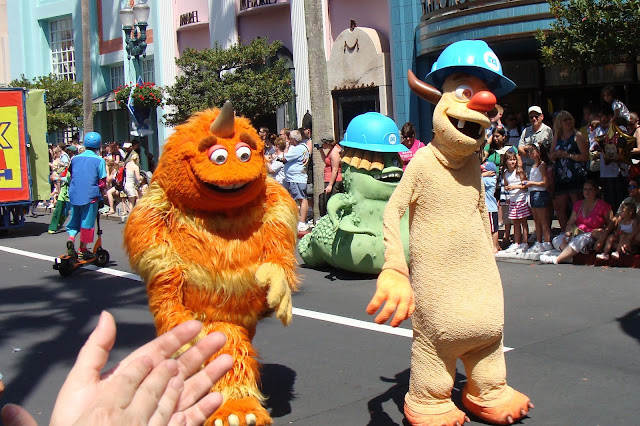 George Sanderson Needleman and Smitty Characters Monsters Inc in Walt Disney World Parade