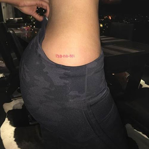 Kylie Jenner Gets New Red Hip Ink