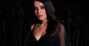radhika madan sheer black saree cleavage