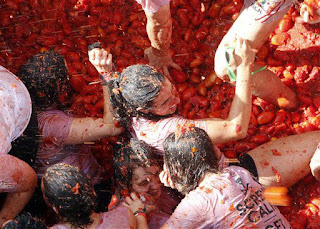 Noon update: August wraps up with milder, drier weather,Crossfire Tomato Festival , Buñol  la tomatina