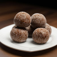 Almond Butter Energy Balls: A blend of almond butter, coconut, and cocoa formed into bite-sized balls.