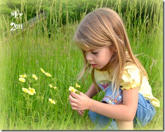 Sarah smells the flowers