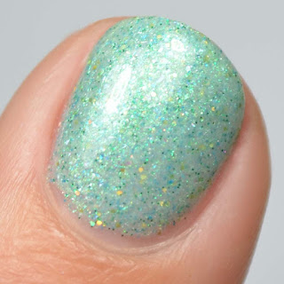 blue jelly nail polish with shimmer