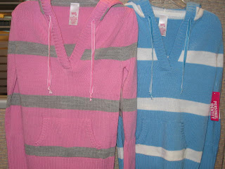 Knotted neck ties on a child's sweater