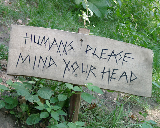 Humans please mind your head sign, Royal Botanic Gardens, Kew, Richmond, London