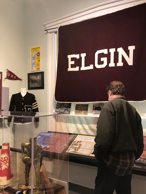 Admiring school memorabilia at Elgin History Museum.