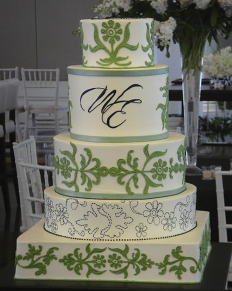 This last gorgeous green wedding cake with orange flowers created by the Jim