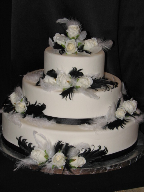 Feathers and rosesmock wedding cake For a real cake I would make sugar 