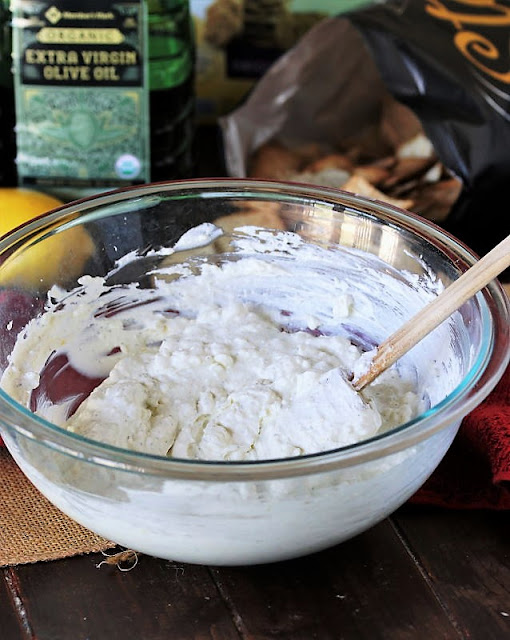 Mixing Creamy Feta Dip In a Mixing Bowl Image