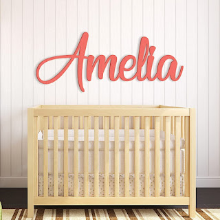 A monogram in wood for a nursery wall